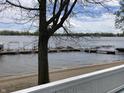 Scenic waterfront view with private docks, sandy beach, and beautiful lake at 20776 Waterscape Way, Noblesville, IN 46062
