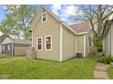 Angle side view of home showcasing the home's siding and roof at 314 N Reisner St, Indianapolis, IN 46222