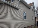 Image displaying the side of the house and showcasing the windows at 501 N Tacoma Ave, Indianapolis, IN 46201