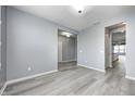 Spacious living room with stylish flooring, gray walls and an open layout perfect for modern living at 5110 Lilium Dr, Plainfield, IN 46168