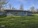 View of the backyard, showcasing the grassy lawn at 1817 Sparrow Ave, Indianapolis, IN 46227