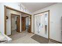 Bright foyer featuring white walls, a decorative front door, and wood trim doorways at 8329 S Christian Dr, Nineveh, IN 46164