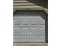 Close-up of a white garage door featuring raised panels and the house number above at 9415 Timber View Dr, Indianapolis, IN 46250