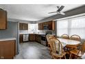 Eat in kitchen featuring stainless steel appliances, wood cabinets and tile flooring at 12078 N 125 W, Alexandria, IN 46001