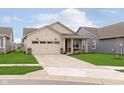 Inviting single-Gathering home with tidy landscaping, a two-car garage, and a quaint front porch, adding curb appeal at 796 Sapp Cir, Westfield, IN 46074