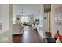 Inviting living room features hardwood floors and a modern design at 845 Blackberry Dr, Greenwood, IN 46143