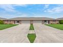 Charming home featuring a convenient driveway and well-maintained landscaping at 126 Appian Way, Anderson, IN 46013