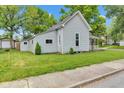 A quaint home with a well-manicured lawn and charming curb appeal at 1508 Monument St, Noblesville, IN 46060