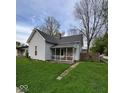 Exterior view of a charming house with a cozy front porch and well-maintained lawn at 1508 Monument St, Noblesville, IN 46060