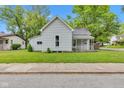Exterior view of a charming house with a cozy front porch and well-maintained lawn at 1508 Monument St, Noblesville, IN 46060