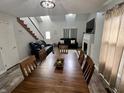 Open-concept living and dining area with plenty of natural light at 3085 Oakmont Dr, Lapel, IN 46051