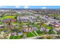 A home surrounded by lush green lawns, situated near a shopping center, offering convenient access to amenities at 32 W Michigan St, Greenfield, IN 46140