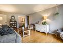 Bright living room with hardwood floors and neutral-toned decor and furniture at 5450 Fenmore Rd, Indianapolis, IN 46228
