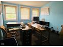Bright home office space with plenty of natural light and ample room for working at 551 E 40Th St, Indianapolis, IN 46205