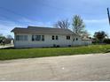 A well-maintained single Gathering home with tidy lawn and clear windows at 1203 E 27Th St, Anderson, IN 46016