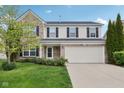 Beautiful two-story home with brick and siding, a two-car garage, and a well-maintained yard at 3430 Burlingame Blvd, Westfield, IN 46074