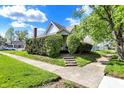 Attractive home showcasing neat landscaping and a welcoming entrance at 704 Baronne St, Lebanon, IN 46052