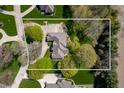 Expansive aerial view showcasing the home's layout, surrounding greenery, and lot size at 923 Woodcrest Way, Anderson, IN 46012