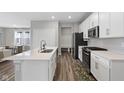 Bright kitchen with modern appliances, a center island, and ample counter space, perfect for cooking at 9696 Parkhurst Xing, McCordsville, IN 46055