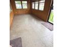 Bright and airy sunroom with multiple windows and neutral flooring at 2402 S Rybolt Ave, Indianapolis, IN 46241