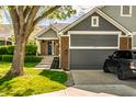 Beautiful front of a well-maintained home with landscaped yard and a private driveway at 7849 Clearwater Cove Dr, Indianapolis, IN 46240