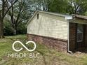 This home shows off a vinyl siding exterior, and a brick foundation at 7916 Catawba Ct, Indianapolis, IN 46217