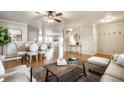 Open living space with dining area, hardwood floors, and neutral tones at 8269 S Midnight Dr, Pendleton, IN 46064