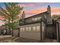 Back exterior view featuring a balcony, windows, and siding at 1030 Stratford Hall # 17-3, Indianapolis, IN 46260