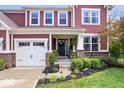 Charming home featuring a well-maintained front yard and covered entryway at 10531 Cleary Trce, Fishers, IN 46040
