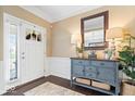 Inviting foyer with stylish console table, mirror, and elegant decor at 10531 Cleary Trce, Fishers, IN 46040