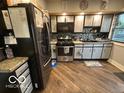 Modern kitchen with stainless steel appliances and sleek countertops at 1623 Oliver Ave, Indianapolis, IN 46221