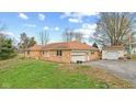 Spacious home with detached garage and well manicured lawn at 647 N 100 W, Franklin, IN 46131