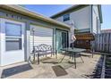 Private backyard patio area, complete with seating and outdoor dining at 6814 Summer Time Dr, Indianapolis, IN 46226