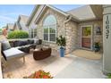 Inviting outdoor patio featuring comfortable seating, perfect for relaxing or entertaining guests at 16637 Brownstone Ct, Westfield, IN 46074