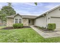 Attractive home featuring brick accents, well-maintained landscaping, and a cozy entrance at 17752 Sanibel Cir, Westfield, IN 46062