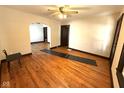 Bright living room with pristine hardwood floors and neutral paint, perfect for relaxation at 324 E Southern Ave, Indianapolis, IN 46225