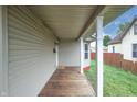 View of the covered front porch; the perfect space to enjoy the outdoors at 625 Maple St, Columbus, IN 47201