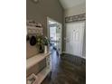 Home foyer features stylish decor, a console table, and seamless access to other rooms at 932 Sagittarius Ave, Franklin, IN 46131