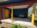 Bright porch with comfortable seating area and classic architectural details offering a relaxing outdoor space at 1050 Jefferson Ave, Indianapolis, IN 46201