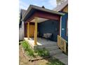 Welcoming porch with sturdy columns, a bench, and decorative touches, ideal for enjoying the outdoors at 1050 Jefferson Ave, Indianapolis, IN 46201