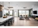 Spacious open floor plan with a modern decor, stylish furnishings and an eat in kitchen area at 15882 Vitalize Run, Fishers, IN 46040