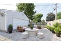 Inviting backyard patio with stylish seating, decorative plants, and a cozy ambiance at 1855 Cruft St, Indianapolis, IN 46203