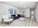 Bright living room featuring modern decor, stylish furniture, and lots of natural light at 2021 Reformers Ave, Indianapolis, IN 46203