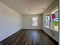 Bright living room featuring durable floors, neutral walls, and natural light at 1216 Mcbride St, Greenfield, IN 46140