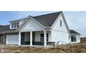 Beautiful home with stone accents, a covered porch, and lovely curb appeal at 14913 Higgins Dr, Westfield, IN 46074