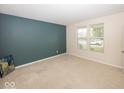 Cozy bedroom with natural light from two windows and a peaceful atmosphere at 2006 Creek Bank Dr, Columbus, IN 47201