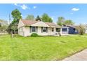 Quaint single-story house with inviting curb appeal and classic design at 2625 N Boehning St, Indianapolis, IN 46219