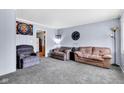 Comfortable living room with ample seating and neutral decor at 2625 N Boehning St, Indianapolis, IN 46219