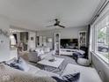 Inviting living room with a comfortable sectional sofa, large windows, and modern decor at 7216 N Parker Ave, Indianapolis, IN 46240