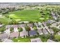 Stunning aerial view of a home on the golf course with lush greenery and neighborhood charm at 12092 Sugar Creek Rd, Noblesville, IN 46060